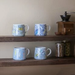 HAREKUTANI Porcelain Butterfly Mug -Global Kitchen Japan Shop HAREKUTANIPorcelainButterflyMug 2 13407f55 0f56 4d3a 9550 ba7b458d85ea