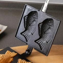 Iwachu Nambu Cast Iron Taiyaki Fish-Shaped Waffle Iron -Global Kitchen Japan Shop IwachuNambuCastIronTaiyakiFish ShapedWaffleIron 4 6500a677 8fd0 45ba ad29 5038225e0bce